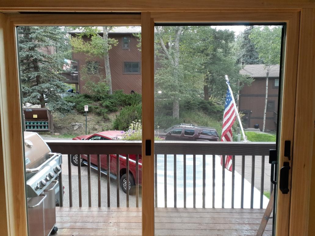 Evergreen CO. Andersen 200 series wood-clad patio sliding door interior pine