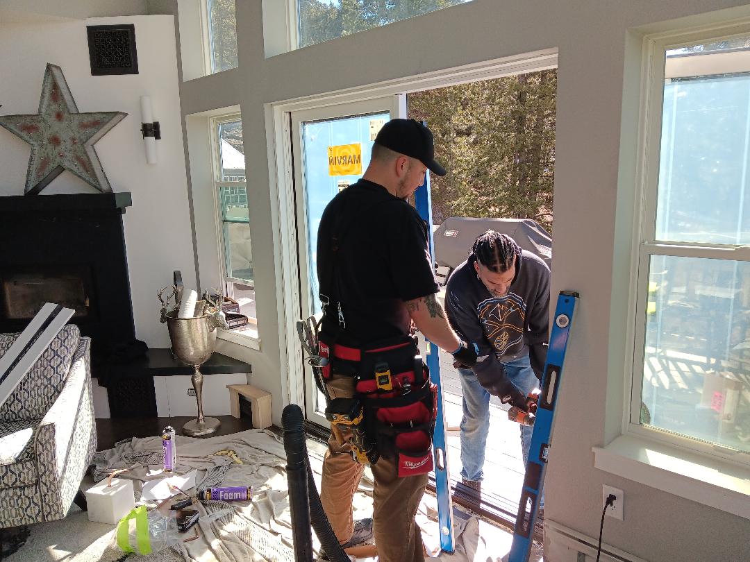 Lead Techs Ryan and CJ Installing a double panel outswing Marvin product french door