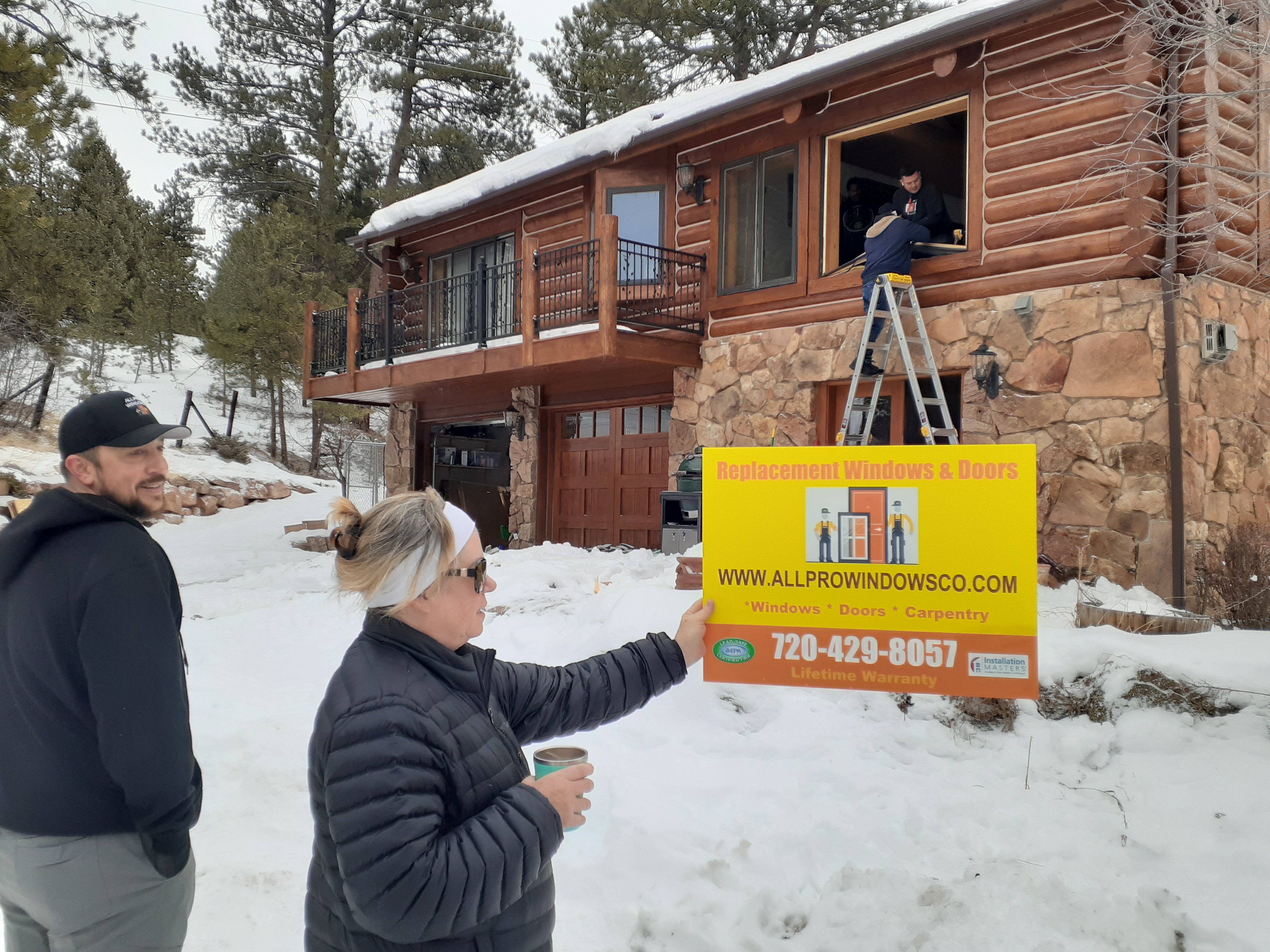 Morrison, CO. Very happy All Pro Windows customer photo posing with our company sign